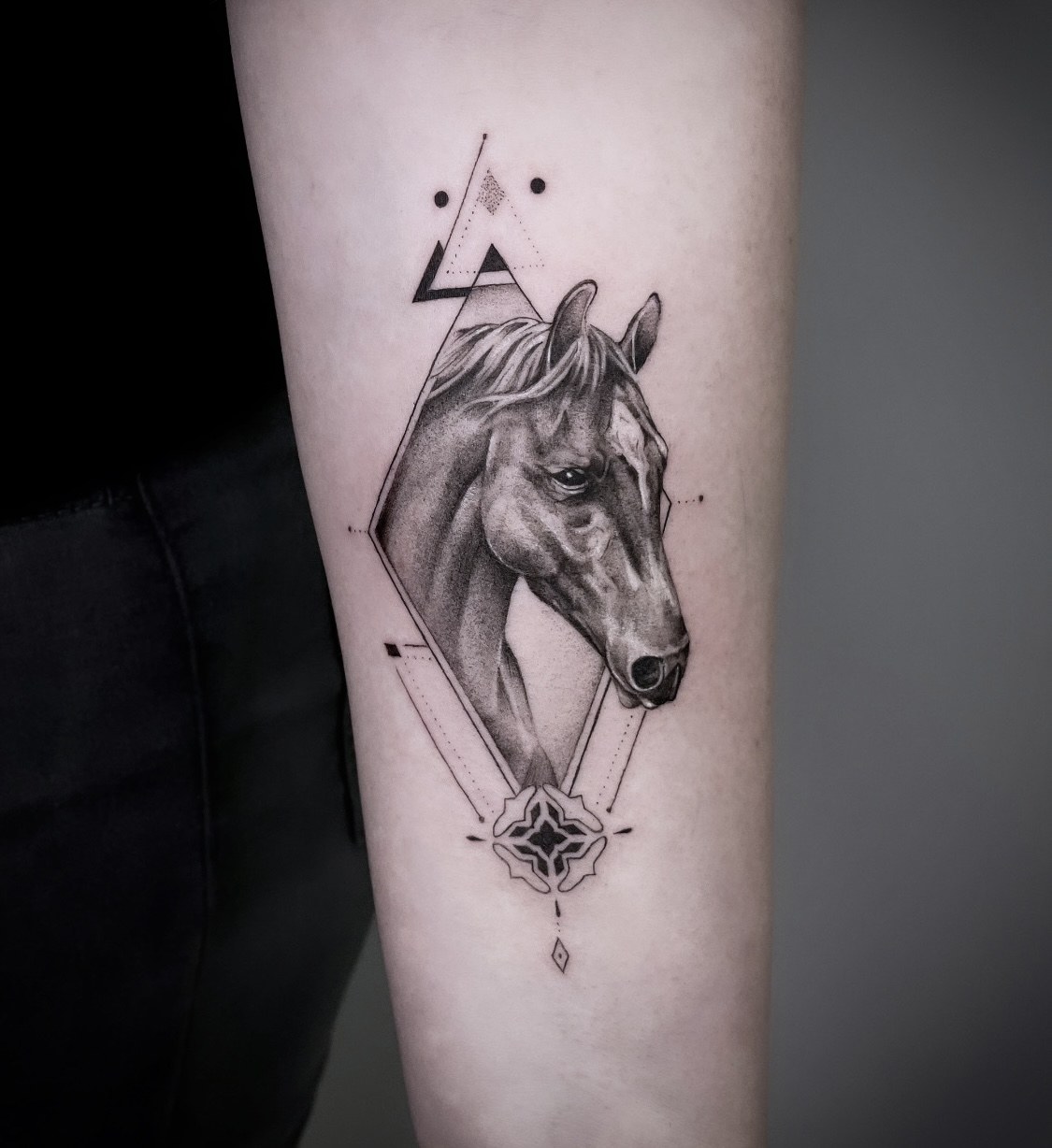 Realistic horse portrait tattoo